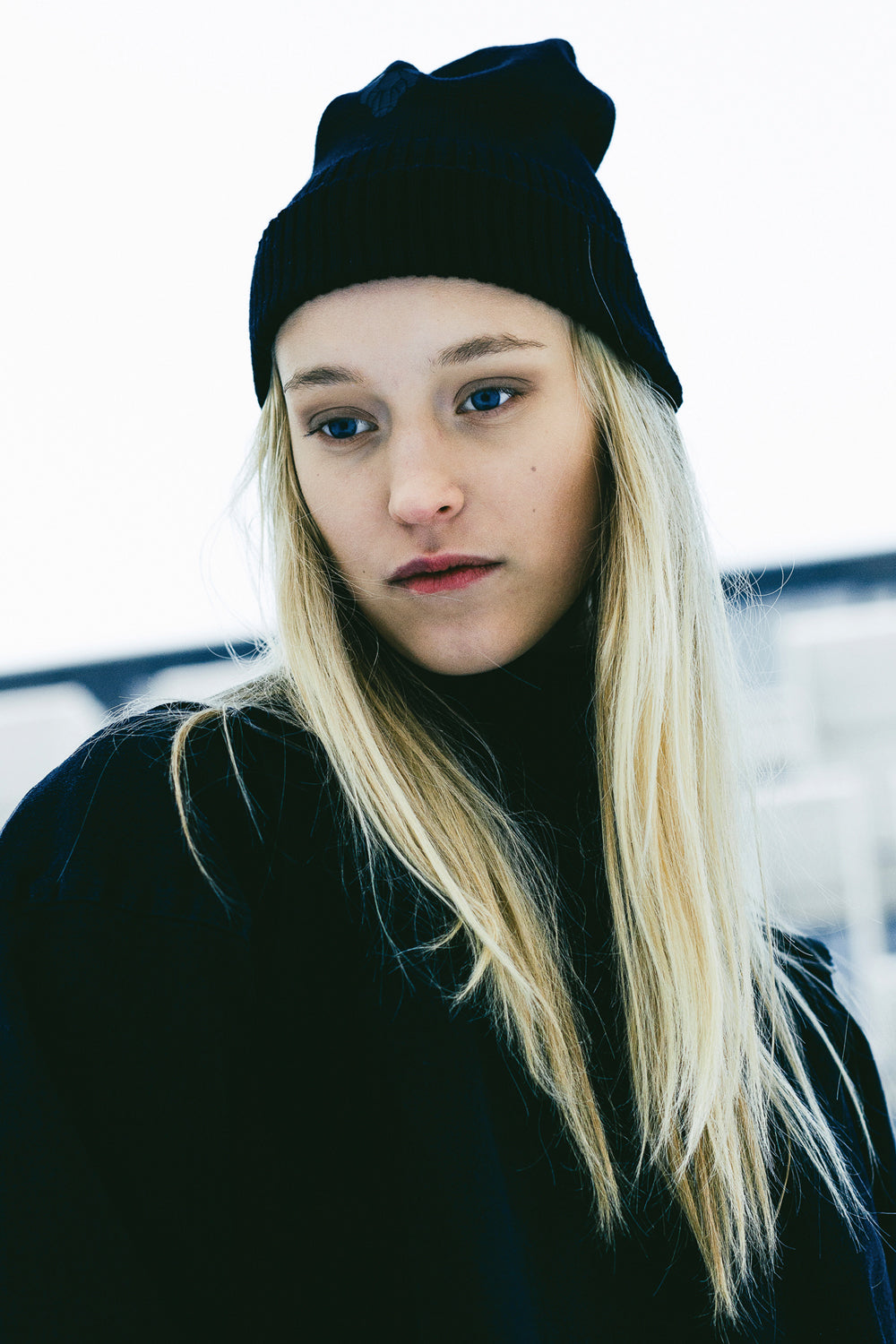 One Wolf Dark Street Beanie front view, black 100% wool unisex beanie