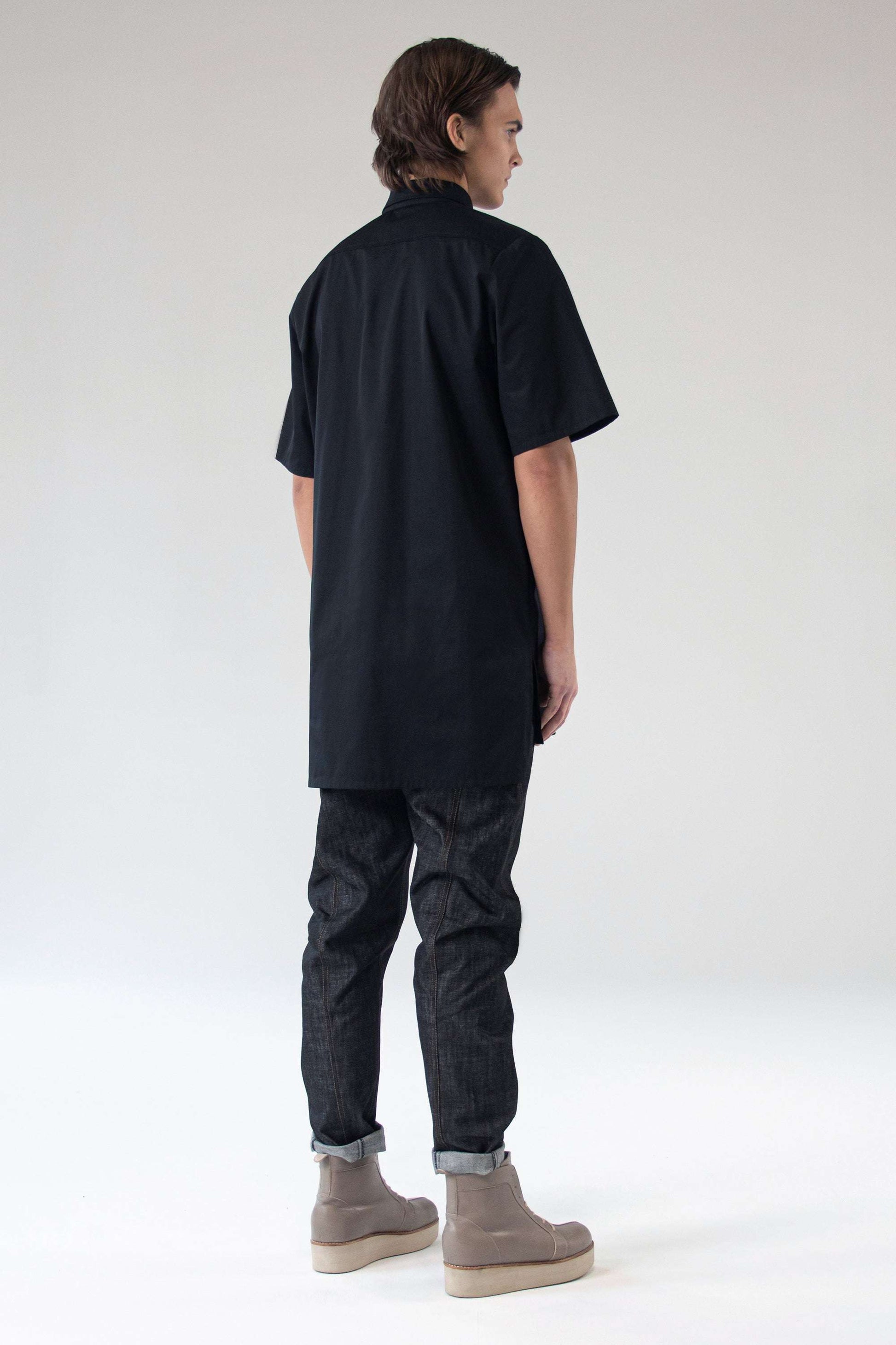 Back view of One Wolf Shirt Seeker, unisex black cotton shirt